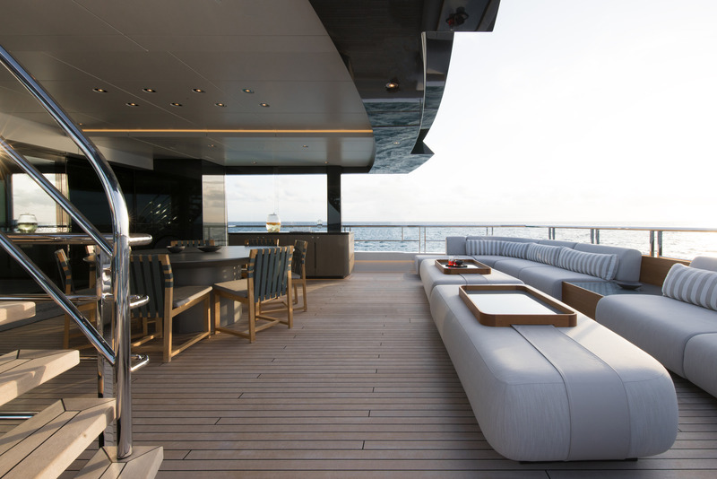 Press kit | 889-06 - Press release | BURDIFILEK Sets Sail Into the World of Luxury Yachting With Entourage - BURDIFILEK - Residential Interior Design - The alfresco dining and lounge area adjacent to the family room. - Photo credit: Guillaume Plisson
