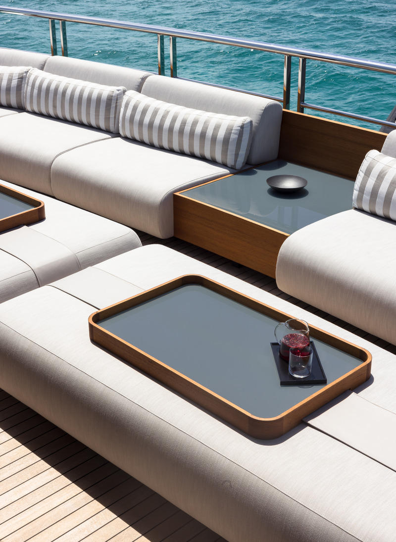 Press kit | 889-06 - Press release | BURDIFILEK Sets Sail Into the World of Luxury Yachting With Entourage - BURDIFILEK - Residential Interior Design - Detail of matching side table and custom-designed serving trays. - Photo credit: Guillaume Plisson