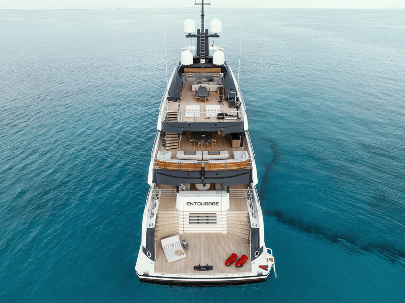 Press kit | 889-06 - Press release | BURDIFILEK Sets Sail Into the World of Luxury Yachting With Entourage - BURDIFILEK - Residential Interior Design - Aerial view of the three main outdoor dining and lounge areas. - Photo credit: Guillaume Plisson