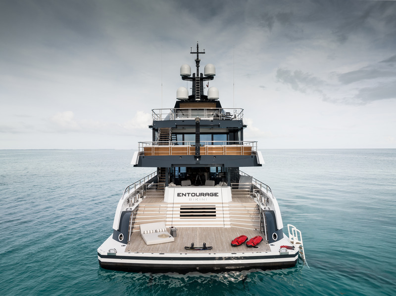 Press kit | 889-06 - Press release | BURDIFILEK Sets Sail Into the World of Luxury Yachting With Entourage - BURDIFILEK - Residential Interior Design - View of stern lounge with swimming platform. - Photo credit: Guillaume Plisson
