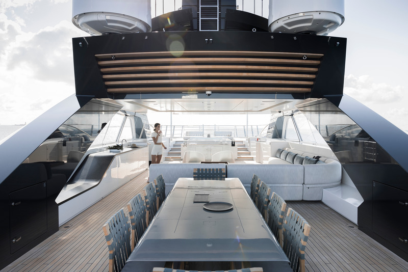 Press kit | 889-06 - Press release | BURDIFILEK Sets Sail Into the World of Luxury Yachting With Entourage - BURDIFILEK - Residential Interior Design - Upper deck dining and lounge with jacuzzi on the foredeck. - Photo credit: Guillaume Plisson
