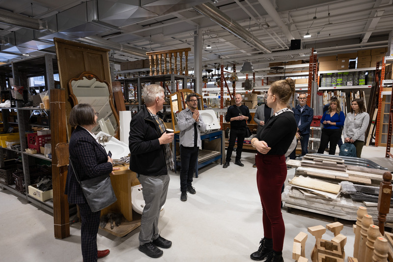 Press kit | 685-21 - Press release | RÉCO: The Inauguration of the New Construction Material Reuse Center in Montreal Draws a Full House - Architecture Without Borders Quebec (AWBQ) - Product -  <p><b>Photo 4 - Visit of RÉCO with Ms Émilie Thuillier (on the left)</b></p>  - Photo credit: Philippe Latour