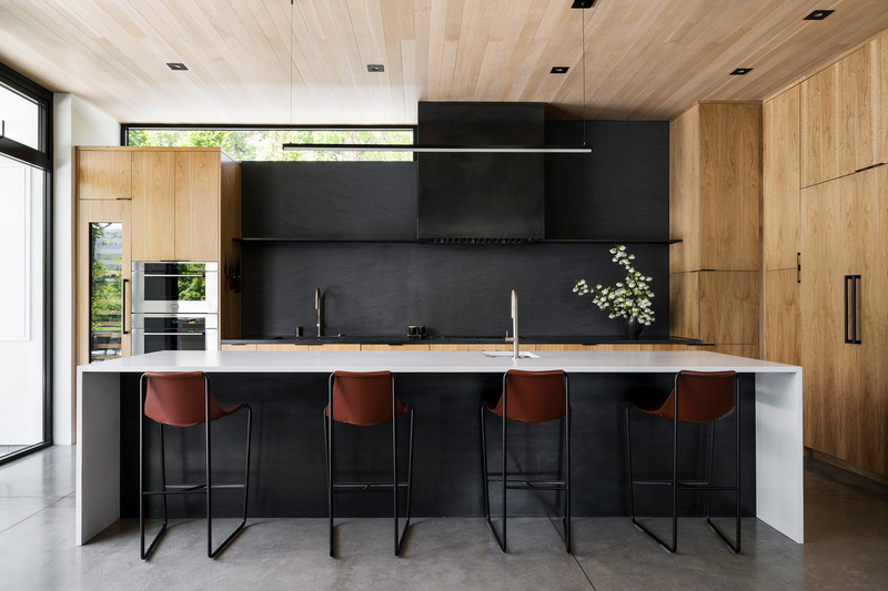 Press kit | 2757-42 - Press release | Sparano + Mooney Architecture's Emigration Creek Residence is Uniquely Shaped by its Site - Sparano + Mooney Architecture - Residential Architecture - <p class="">The dramatic kitchen continues the streamlined palette and features Wolf and Sub-Zero appliances. </p> - Photo credit: Lucy Call Photography