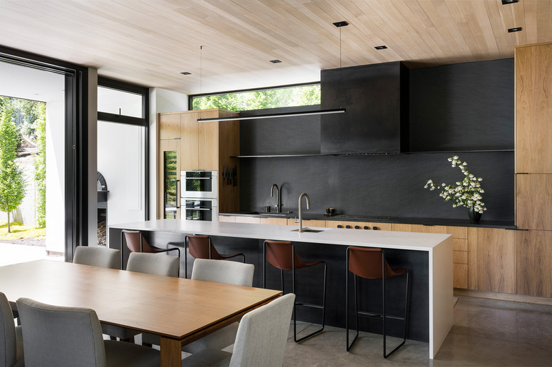 Press kit | 2757-42 - Press release | Sparano + Mooney Architecture's Emigration Creek Residence is Uniquely Shaped by its Site - Sparano + Mooney Architecture - Residential Architecture - <p class="">View of the kitchen from the dining room. The kitchen design incorporates a Sub-Zero refrigerator, freezer and wine fridge columns.</p> - Photo credit: Lucy Call Photography