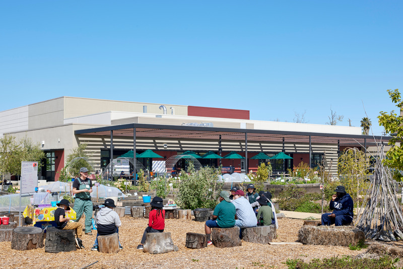 Press kit | 2757-41 - Press release | CAW Architects' Newest Educational Design for Oakland Unified School District Transforms Both Food Education and Distribution - CAW Architects - Commercial Architecture - <p class="">Elementary, middle and high school students utilize the outdoor learning spaces during field trips focused on education around the growth cycles of produce grown there, picking seasons and meal preparation.<br></p> - Photo credit: Bruce Damonte Photography