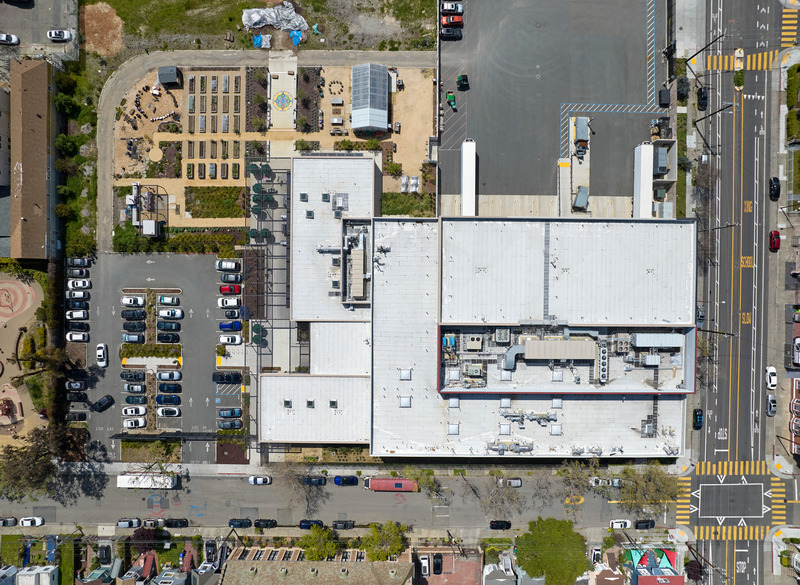 Press kit | 2757-41 - Press release | CAW Architects' Newest Educational Design for Oakland Unified School District Transforms Both Food Education and Distribution - CAW Architects - Commercial Architecture - Aerial view of the campus.  - Photo credit: Bruce Damonte Photography