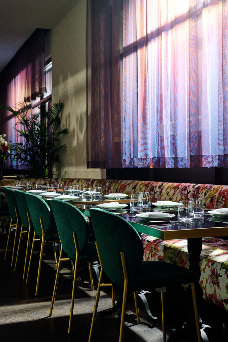 Press kit | 5857-04 - Press release | Studio UNLTD Unveils Design of Cino Restaurant - Studio UNLTD - Commercial Interior Design - The softness of the room is accentuated by translucent, purple drapery. - Photo credit: Chris Rohrer