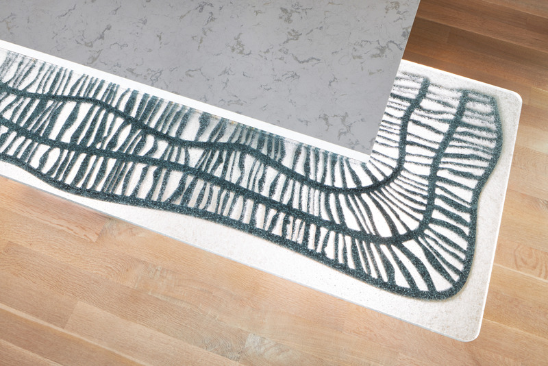 Press kit | 1015-03 - Press release | Bainbridge House - FINNE Architects - Residential Architecture - Detail of custom cast glass breakfast counter - Photo credit: Benjamin Benschneider
