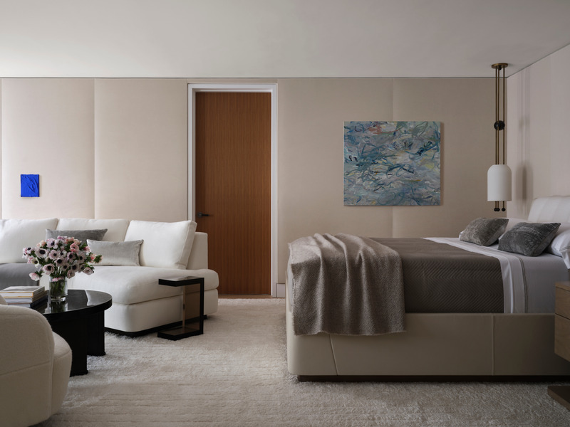 Press kit | 6087-05 - Press release | Palm Residence: A Harmonious Fusion of Hospitality and Home - Daniel Joseph Chenin - Residential Interior Design - Customized Holly Hunt Angelika upholstered bed flanked by custom Lennox nightstands by  Anees Furniture and Apparatus Studio Lantern 1 pendants with painting by Phillip Womack  in the primary suite. - Photo credit: Douglas Friedman