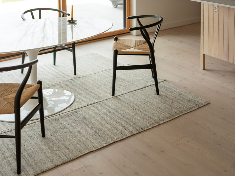 Press kit | 7531-01 - Press release | Celebrating Craftsmanship in Their Latest Rug Collection at ICFF 2024 - Mark Krebs - Product - Stitch rug in pebble - 6'x9' - Photo credit: Thom Fougere