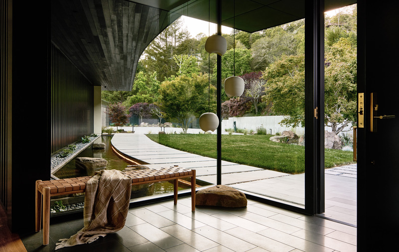 Press kit | 2757-44 - Press release | SWATT + PARTNERS' Eloquently Modern Architecture Lives Well in Singular Settings - SWATT + PARTNERS - Residential Architecture - Kojima House: A koi pond adds a welcoming touch to the entry. - Photo credit:  Nils Timm 
