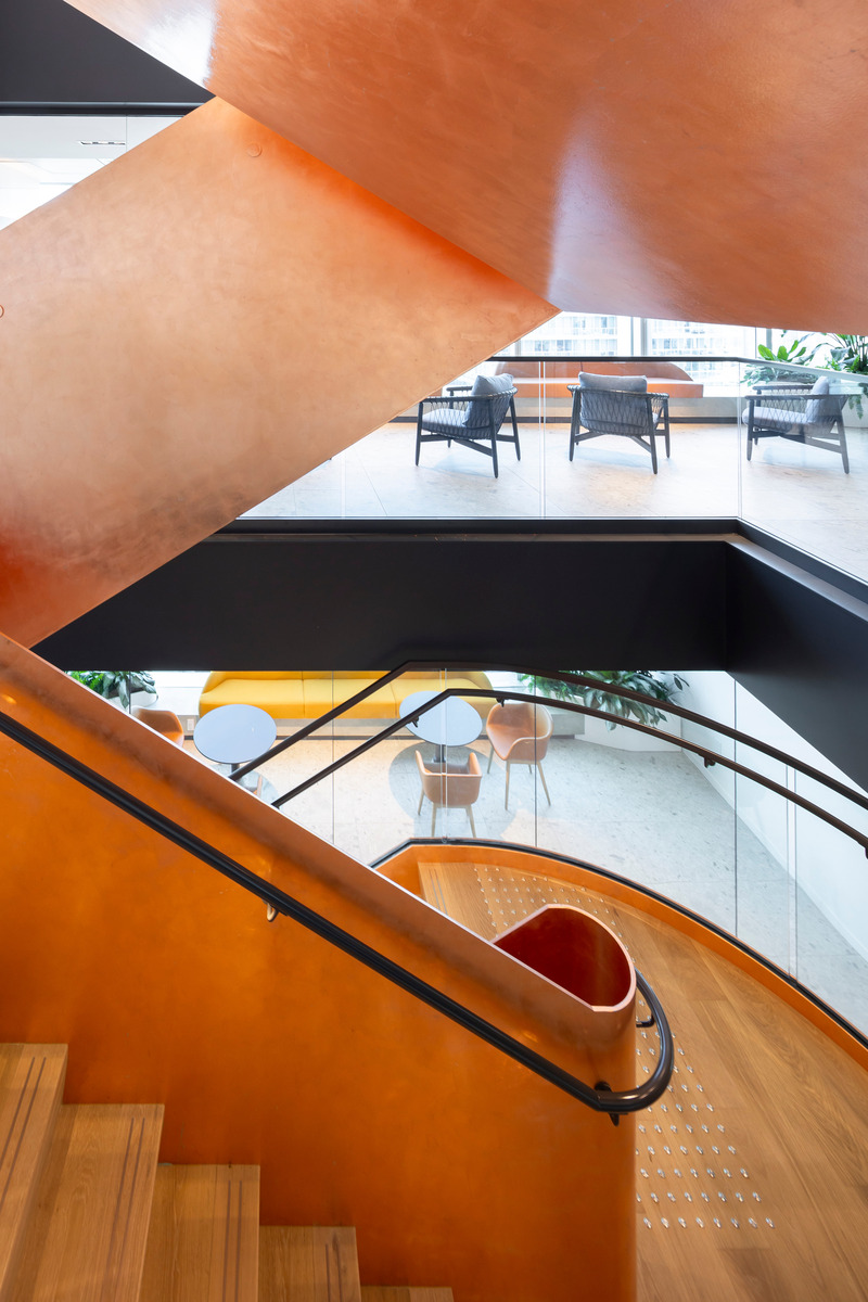 Press kit | 5571-03 - Press release | Vancouver's Newest Office in Top Tier Tower: Sandstorm HQ - Edit Studios Inc. - Commercial Interior Design - Copper Floating Stairwell - Photo credit: Brett Ryan