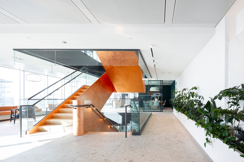 Press kit | 5571-03 - Press release | Vancouver's Newest Office in Top Tier Tower: Sandstorm HQ - Edit Studios Inc. - Commercial Interior Design - Copper Guilded Stair - Photo credit: Brett Ryan