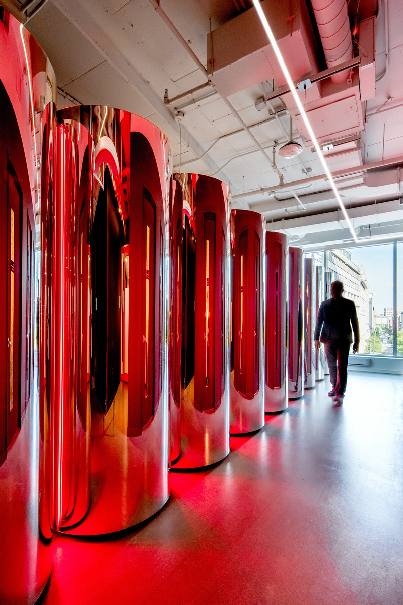 Press kit | 2626-04 - Press release | Plus Company Campus & Cossette Offices - LAAB architecture - Commercial Interior Design - The Mirror Silos in the main circulation axis magnifying the urban environment - Photo credit: Raphael Thibodeau