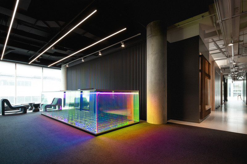 Press kit | 2626-04 - Press release | Plus Company Campus & Cossette Offices - LAAB architecture - Commercial Interior Design - View of reception area with main circulation spine - Photo credit:  Raphael Thibodeau &amp; LAAB