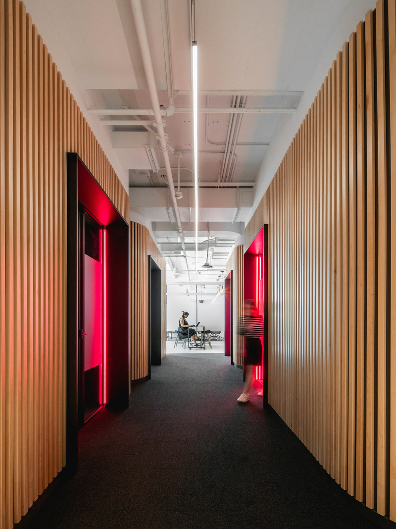 Press kit | 2626-04 - Press release | Plus Company Campus & Cossette Offices - LAAB architecture - Commercial Interior Design - Axial view of recording studios' foyer - Photo credit: Raphael Thibodeau
