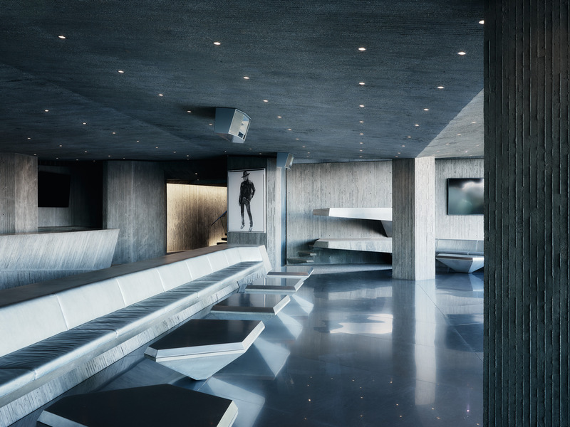 Dossier de presse | 2757-45 - Communiqué de presse | Honoring Architectural Lineage: Conner + Perry Architects Usher in a New Phase for an LA Landmark - Conner + Perry Architects - Architecture résidentielle - <p class=""><b>Club James Nightclub:</b> Concrete seating with custom upholstered silver leather cushions surrounds the stainless-steel dance floor. The cantilevered DJ booth in the background is the control center for state-of-the-art sound and lighting systems that give the space a fully immersive nightclub experience. A portrait of owner Jim Goldstein in his iconic couture, shot by photographer Mikael Jansson, watches over the space near the main entry.</p> - Crédit photo : Joe Fletcher Photography