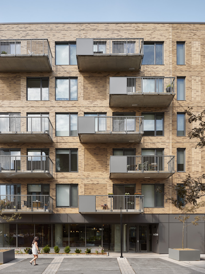 Press kit | 1676-08 - Press release | Mellem Ville-Marie: A Model of Gentle Densification Inspired by Montreal - ADHOC - Residential Architecture - <p>A nod to the neighborhood's industrial past, the project incorporates raw materials such as brick and steel.</p> - Photo credit: Maxime Brouillet 
