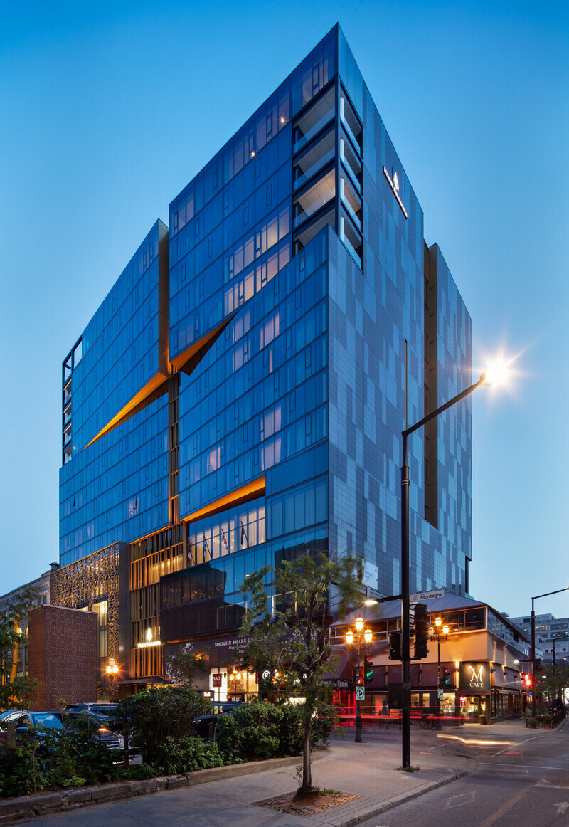 Salle de presse | v2com-newswire | Fil de presse | Architecture | Design | Art de vivre - Communiqué de presse - L’architecture du Four Seasons Hôtel Montréal dévoilée : l’élégante simplicité d’une chaîne en or sur une robe noire - Lemay | Sid Lee Architecture